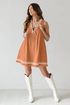 Orange sleeveless dress with white trim in the Beautiful Embroidered Vest Denim Dress fashion