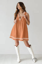 Beautiful embroidered vest denim dress in orange with white trim