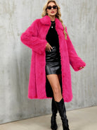 Vibrant fuchsia faux fur coat in long warm plush design for fashion