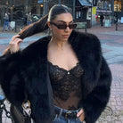 Gorgeous faux fur fox jacket with lace top and jeans in Langry fashion