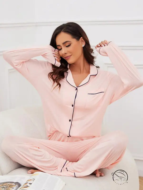 Pink long-sleeve modal pajama set with black piping for women