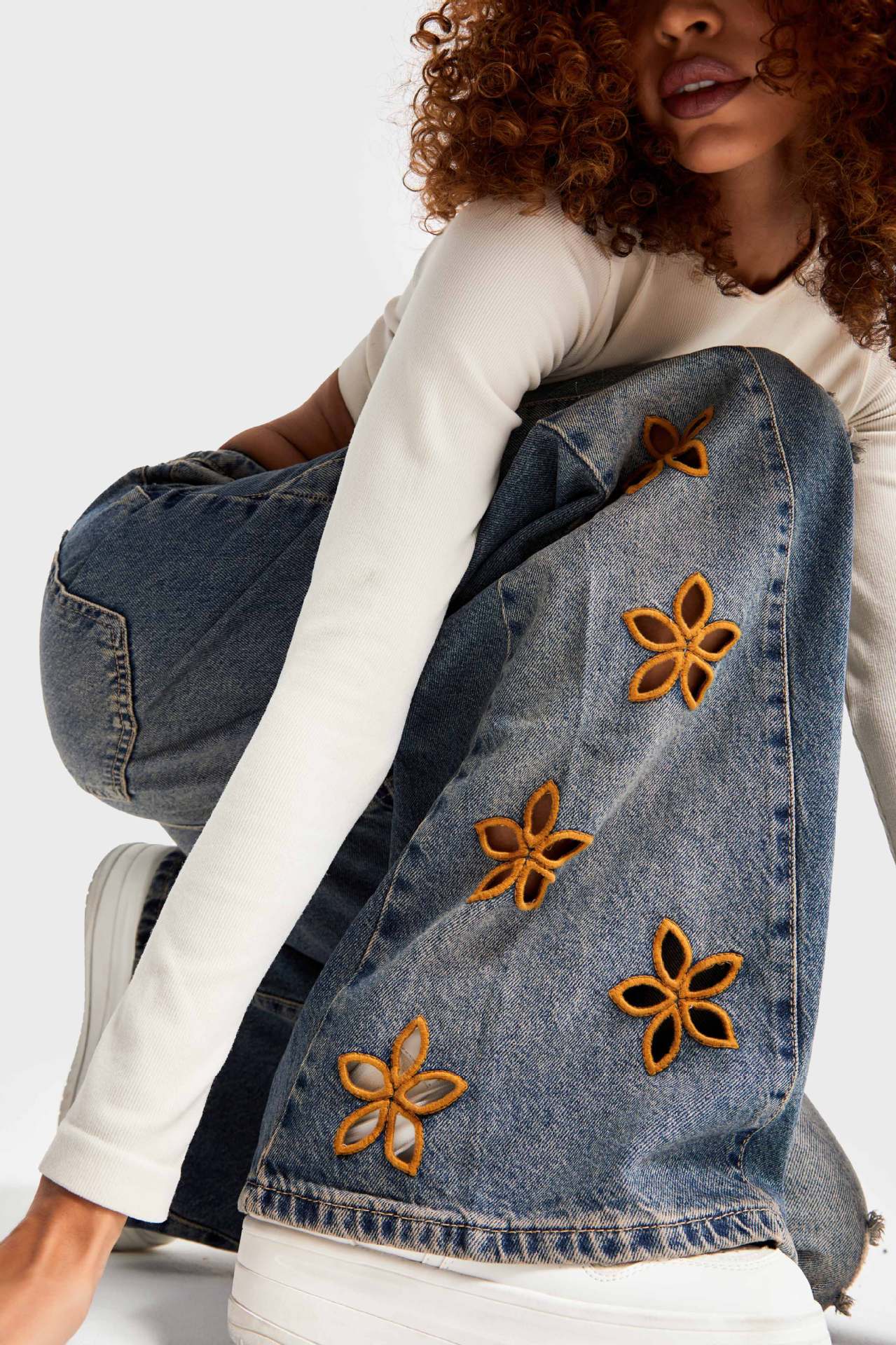 Fashionable high-waist Langry denim trousers with orange-yellow floral embroidered jacket