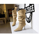 Tan langry suede ankle boots with ruched design and high heels