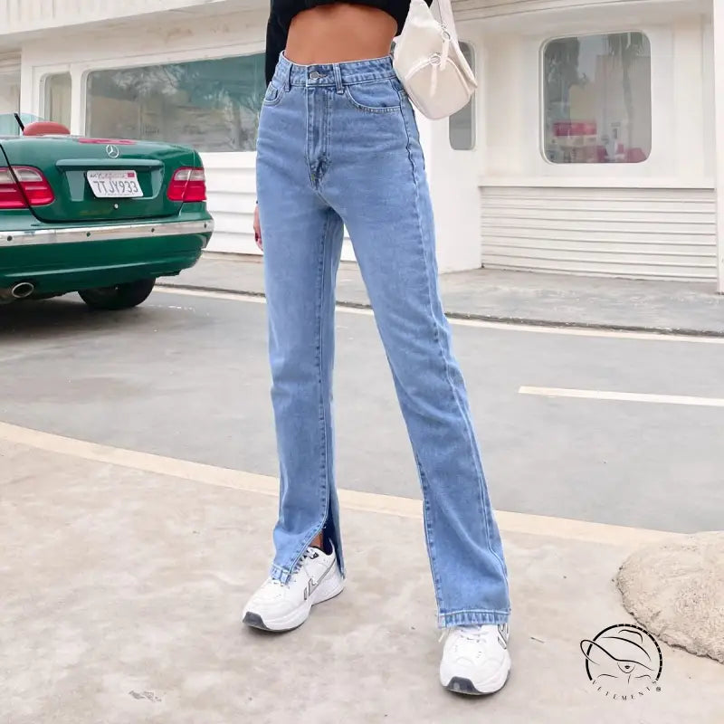 Light wash high-waisted straight-leg denim pants with ankle slit