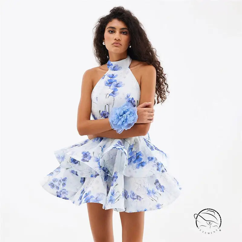 Exquisite short halter dress in white with blue floral prints and ruffled skirt, langry fashion ملابس