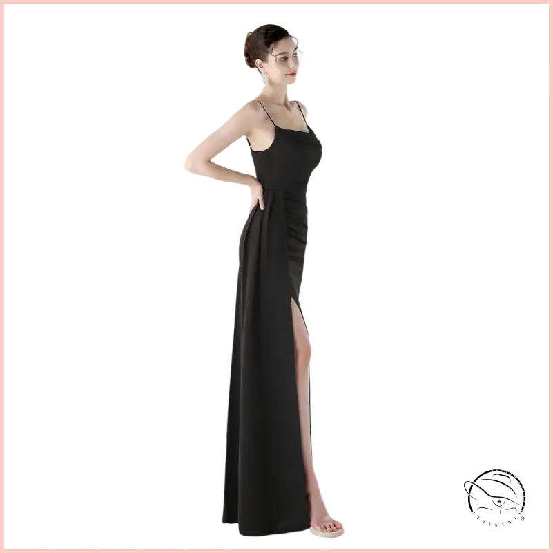 Elegant high slit evening dress in sleek black satin with spaghetti straps