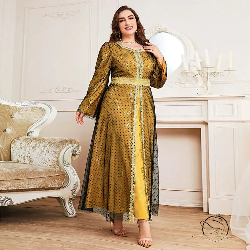 Woman in long sleeve A-line dress with golden-yellow polka dots