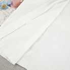 White cotton langry fashion nightgown with smooth texture and neat stitching