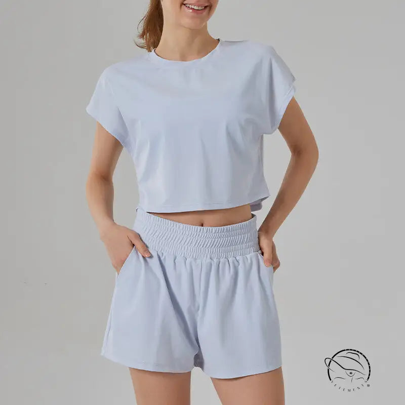 Light blue loose sports yoga cropped t-shirt and shorts fitness set