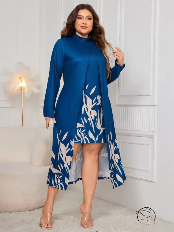 Faux two piece long sleeve dress with blue top and leaf-print skirt