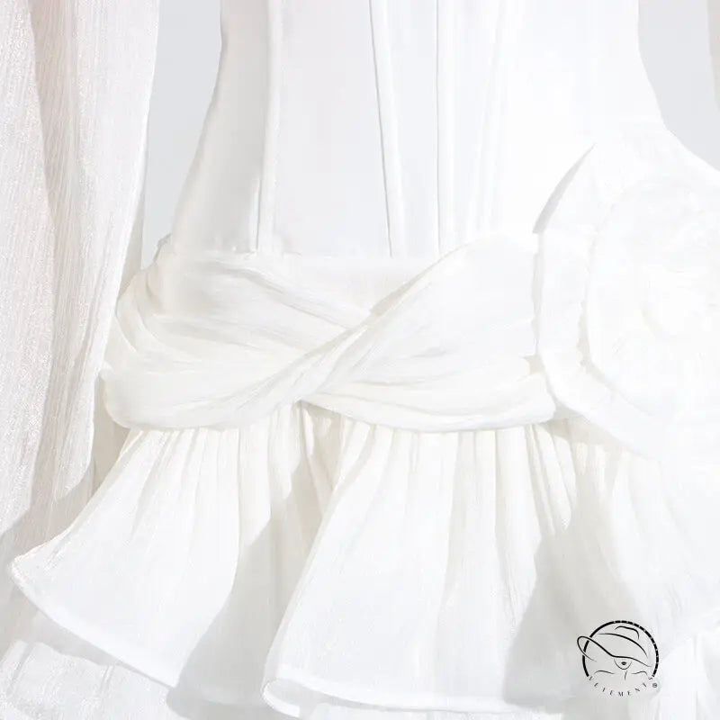 Elegant white ruffled blouse with bell sleeves in Langry fashion ملابس