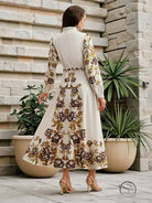 Elegant langry floral patchwork maxi dress in off-white with brown and gold embroidery