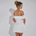White off-shoulder mini dress with sequined trim detail for elegant fashion style