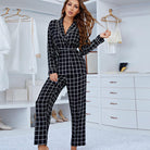 Black and white checkered long sleeve pajama set with belted blazer and wide-leg pants