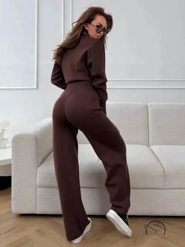 Langry fashion brown tracksuit set with white sneakers and sunglasses