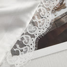 White lace trim on langry ice silk pajamas with floral patterns