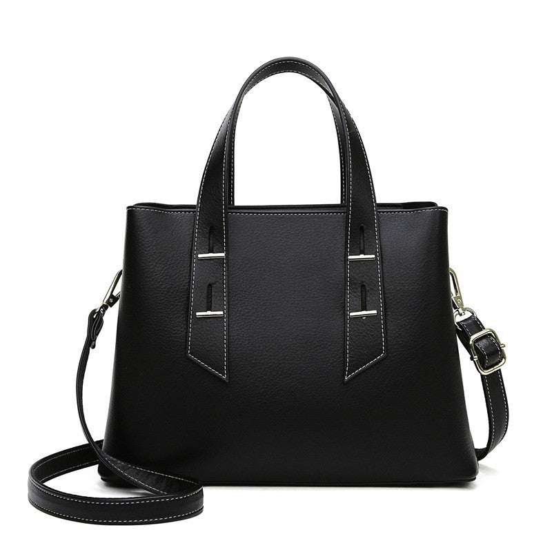 Langry fashion black leather tote bag with silver hardware and adjustable strap