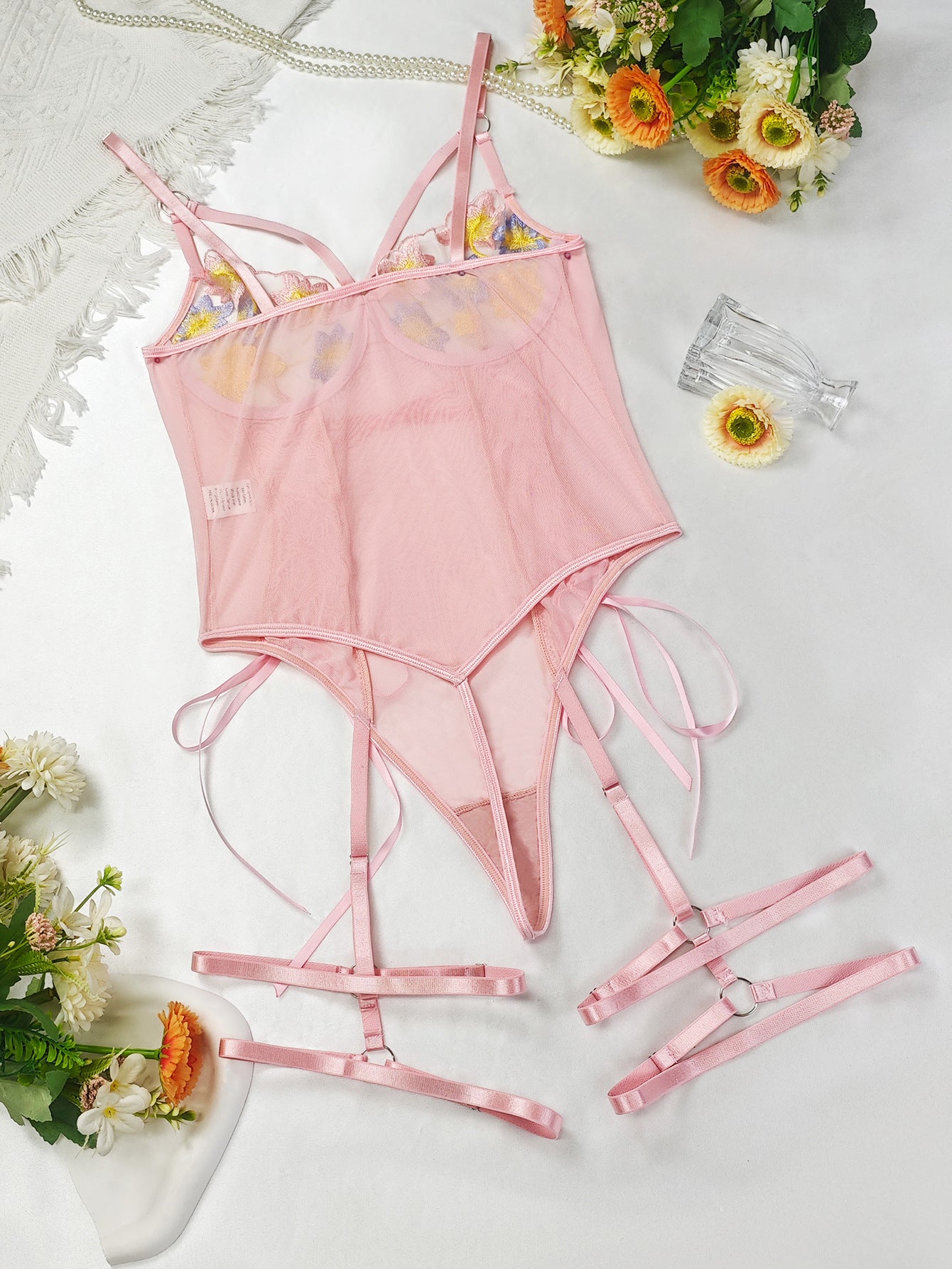 Pink embroidery beauty back lingerie set with floral accents and adjustable straps in fashion style