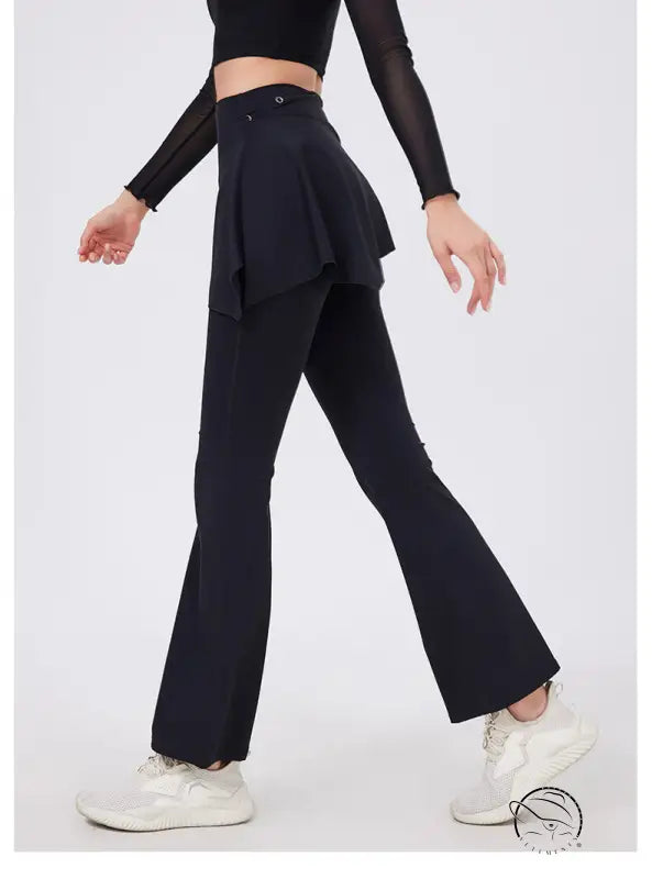 Black hip lifting yoga pants with nude feel peplum waistband and sneakers