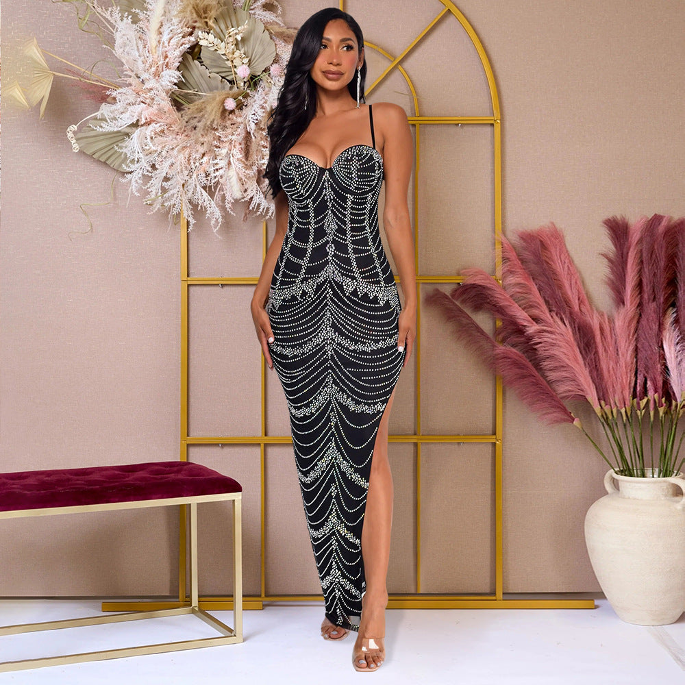 Elegant black split dress featuring silver beaded scalloped pattern and side slit