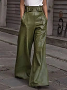 Olive green faux leather bell bottom pants with high belted waist