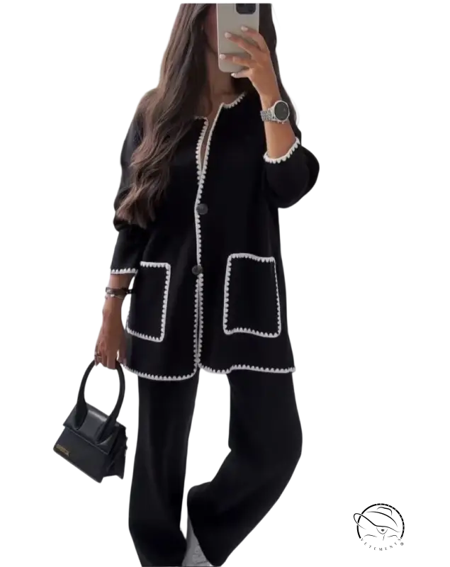 Black knit cardigan with white piped trim, part of women stitching bag set autumn winter
