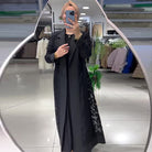 Black floral abaya trench coat with gold trim in Langry fashion