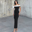 Elegant black and white off-shoulder column dress showcasing modern fashion in ملابس