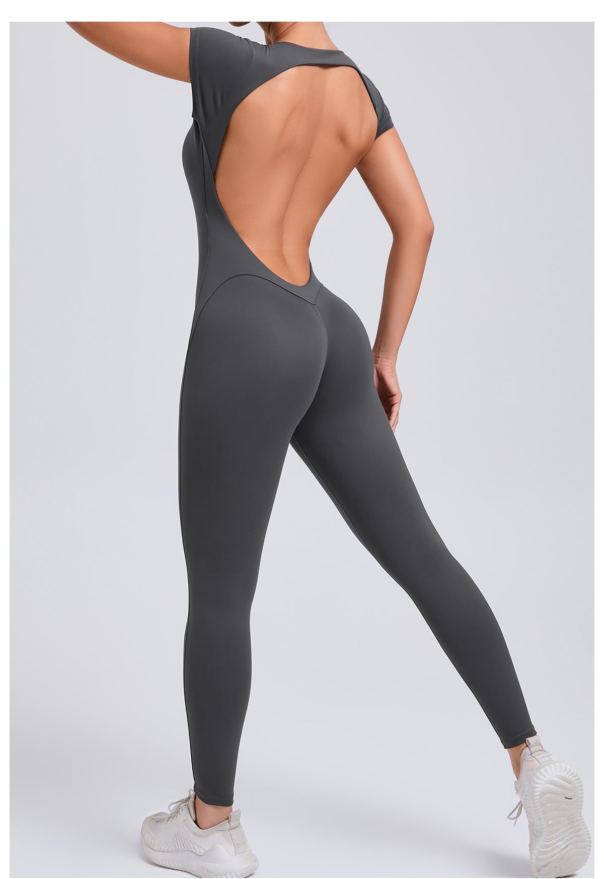 Sleek dark gray langry fashion yoga bodysuit with high-cut legs and open back