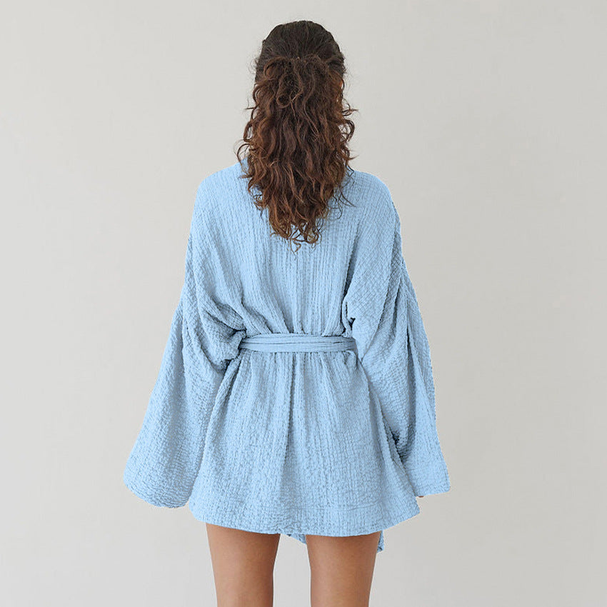 Light blue textured long-sleeve robe with tie waist, ideal for fashion and comfortable short nightgown wear