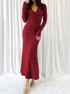 Burgundy long-sleeved ruched dress showcasing elegant fashion in ملابس for any occasion