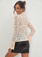 Slim fit bell sleeve cream lace blouse with floral pattern and black leather skirt
