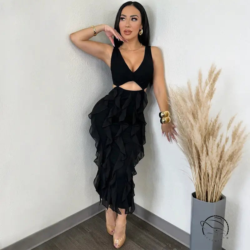 Enchanting ruffled split dress with black organza skirt, cutouts, gold hardware