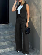 Elegant black vest and wide-leg pants set showcasing fashionable langry ملابس style