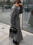 Black Quilted Miu Miu Handbag with Gold-Tone Hardware in Langry Fashion Coat