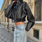 Fashionable Langry faux leather cropped jacket with zipper and belt detail