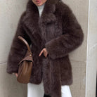 Brown faux fur coat with high collar and long sleeves in Langry fashion
