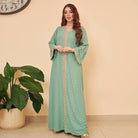 Gorgeous mint green embroidered kaftan dress with bell sleeves, gold trim, langry fashion ملابس