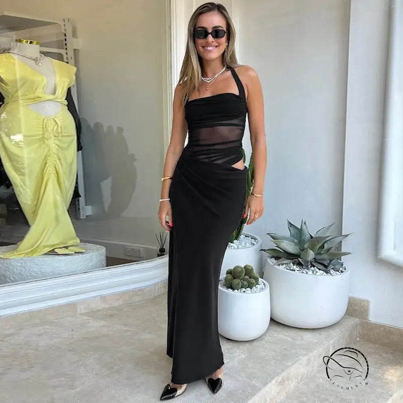 Woman in stunning halter split maxi dress