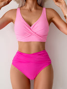 Pink two-piece swimsuit from Gorgeous Split Swimsuit for trendy summer fashion langry