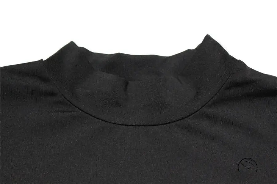 Close-up of solid color hollow cutout cropped tight black mock neck top