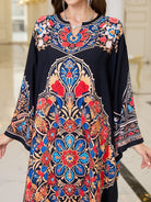 Elegant loose black floral print tunic dress with three-quarter sleeve length