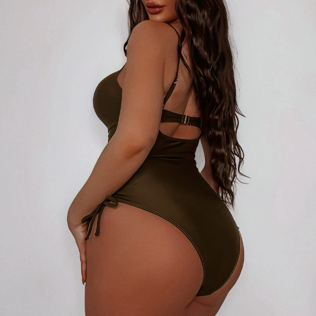 Dark brown one-piece swimsuit with cutout details, adjustable straps, stylish ملابس