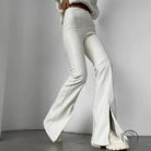 Winter faux leather slit pants with white split-hem flared design
