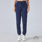 Navy blue casual loose tapered sports pants with elastic cuffs