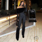 Elegant langry fashion ملابس: black fur-trimmed off-shoulder jumpsuit with flared pants and ankle boots