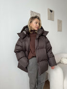 Brown puffer jacket from Cotton Coat Jacket, perfect for stylish fashion ملابس