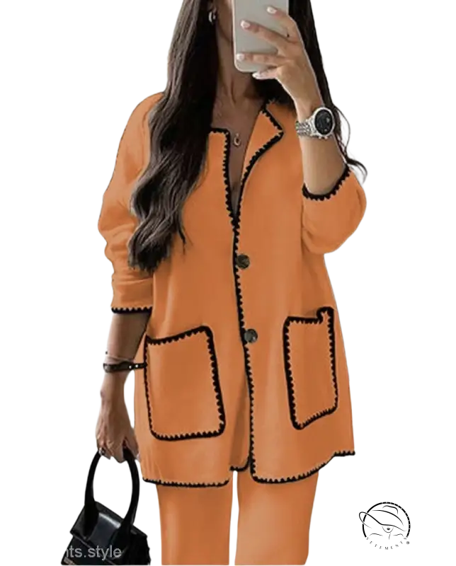 Orange two-piece suit with black scalloped trim for women autumn winter set
