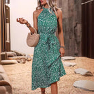 Green floral halter dress showcasing trendy summer fashion for women from Langry ملابس