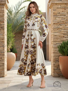 Woman in floral embroidery maxi dress with slimming waist